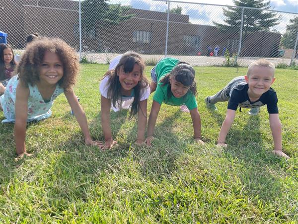 Pfeiffer-Burleigh students show off their push-up skills at their S.A.I.L. showcase